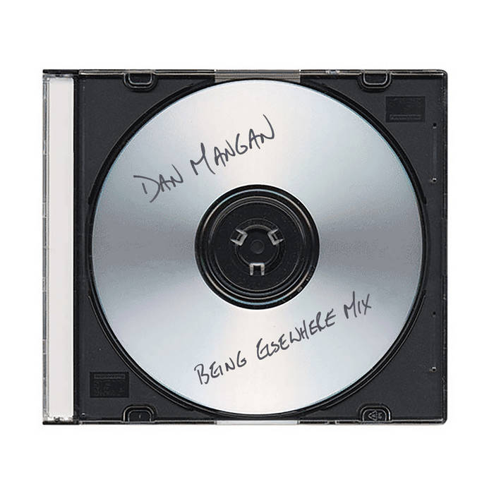 image is a photo of a CD-R in a clear case with handwriting on the CD